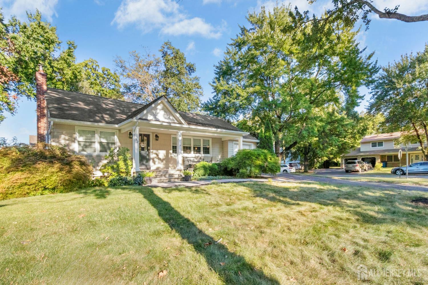 52 Brookside Terrace Clark, NJ 07066 - Photo 22 of 26 a front view of a house with a yard