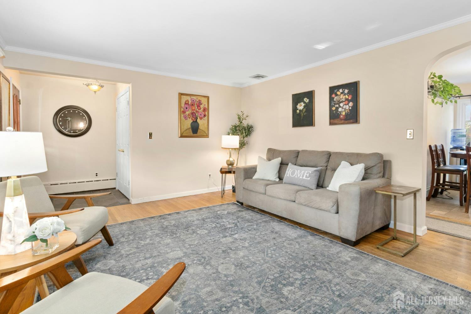 52 Brookside Terrace Clark, NJ 07066 - Photo 4 of 26 a living room with furniture and a wooden floor