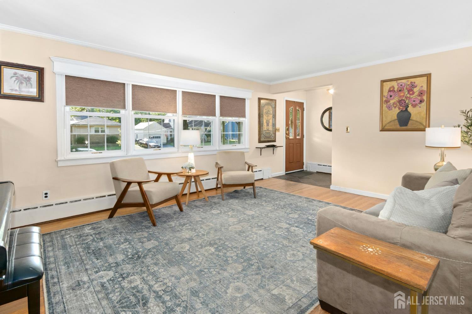 52 Brookside Terrace Clark, NJ 07066 - Photo 5 of 26 a living room with furniture and a window