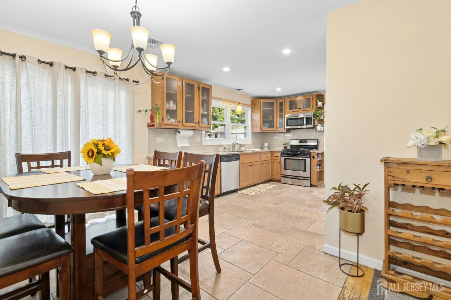 52 Brookside Terrace Clark, NJ 07066 - Photo 6 of 26 a view of a dining room with furniture
