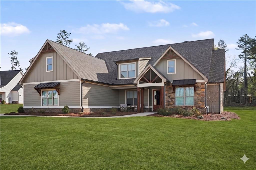 287 Conner Lane Williamson, GA 30292 - Photo 2 of 33 a front view of a house with garden