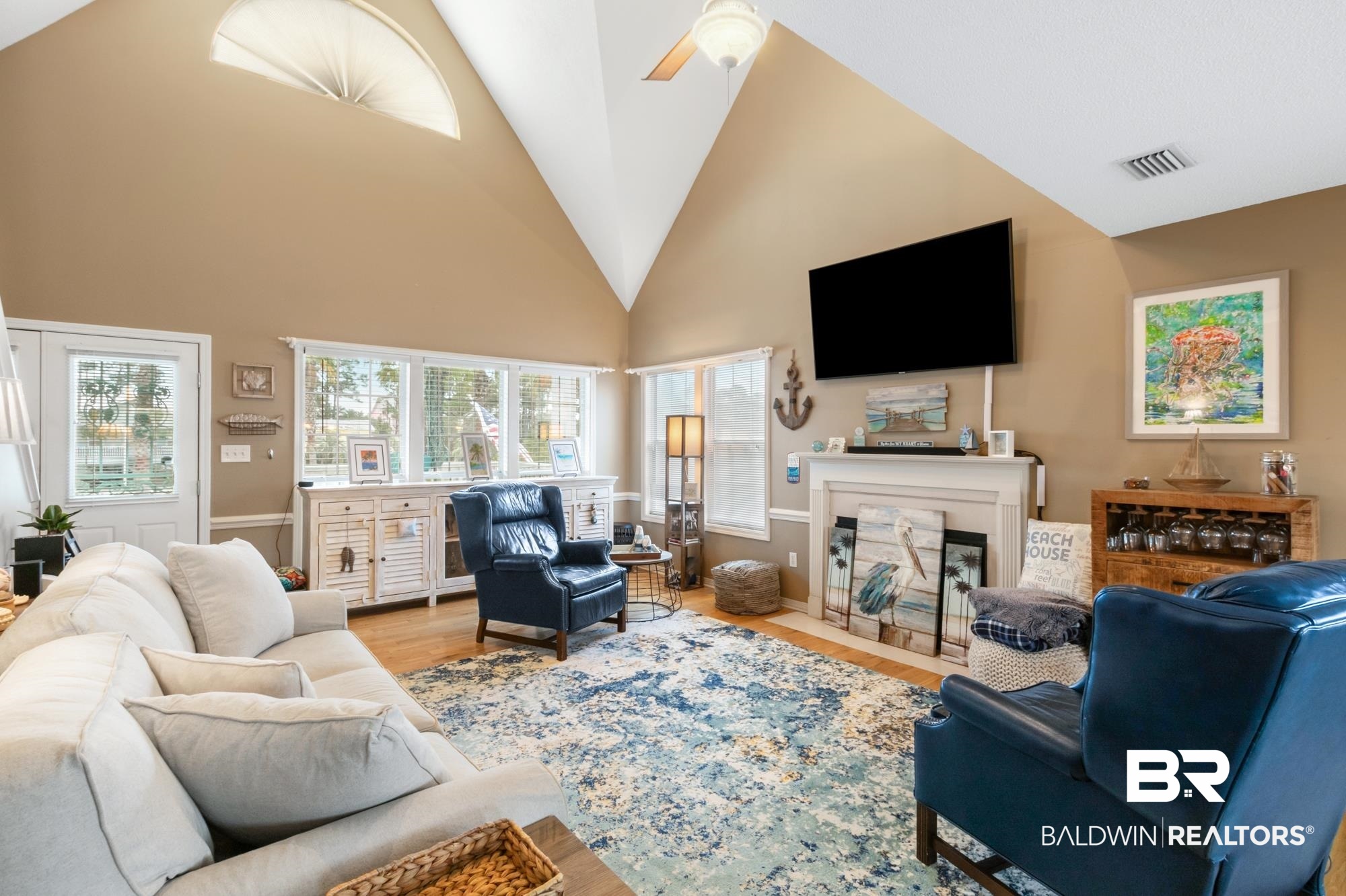 328 Windmill Ridge Road Gulf Shores, AL 36542 - Photo 8 of 47 Living room with ceiling fan, light hardwood / wood-style floors, and high vaulted ceiling