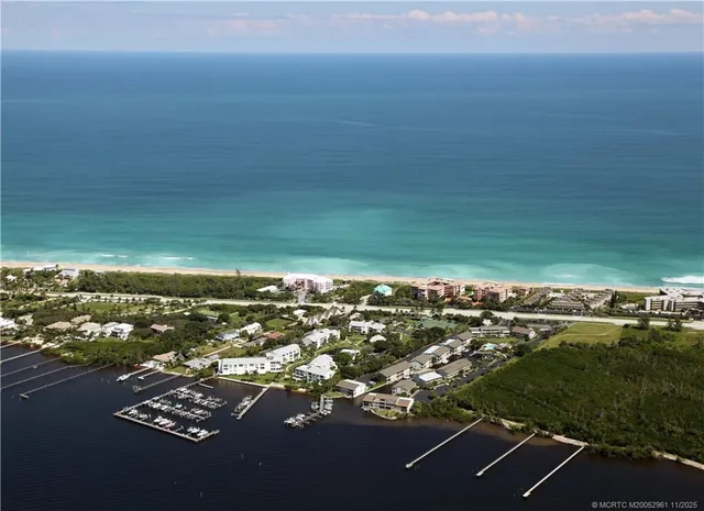 a view of a city with lots of residential buildings in ocean