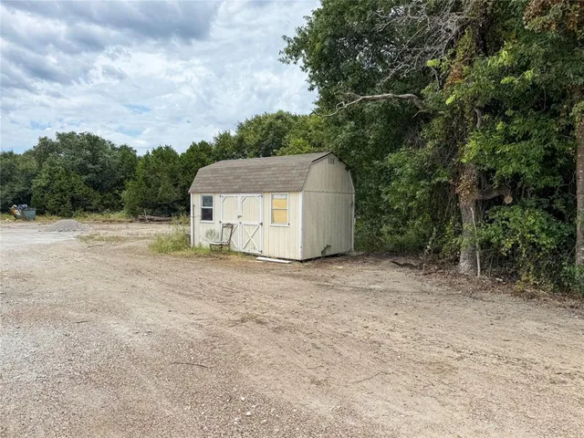 a fire hydrant in the middle of a field