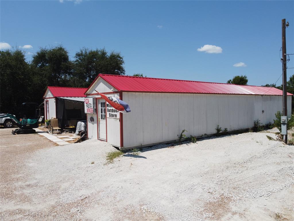 103 Sharon Street Whitney, TX 76692 - Photo 3 of 23 a view of a house with backyard and sitting area