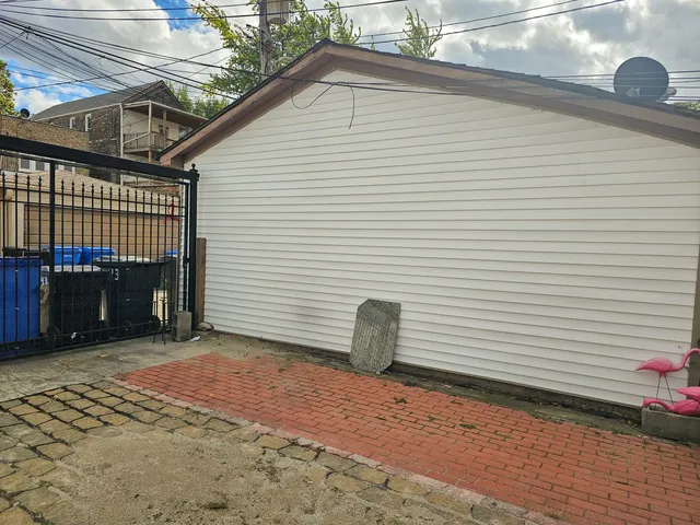 a view of a yard with a tree