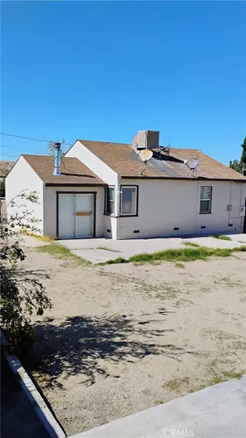 a front view of a house with swimming pool