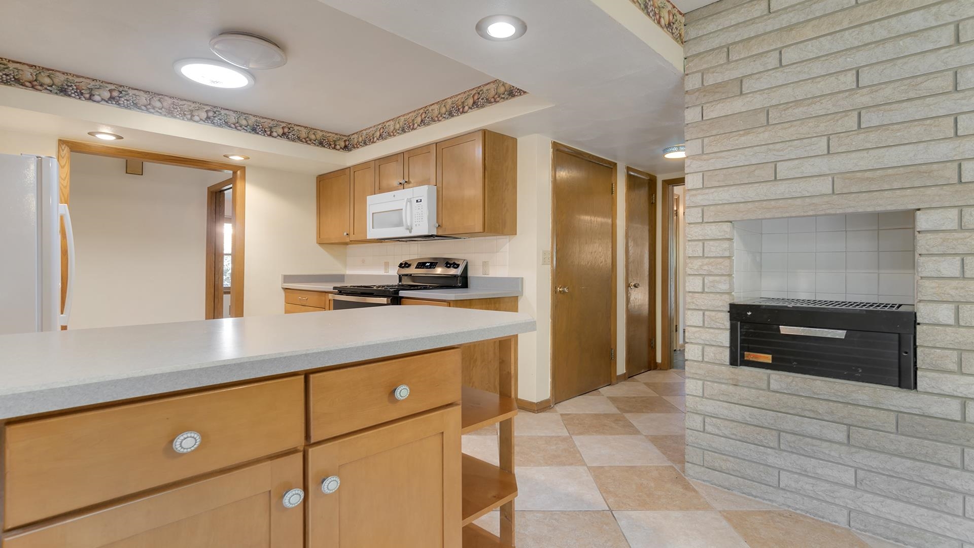 4644 Pepper Drive Rockford, IL 61114 - Photo 15 of 45 a kitchen with stainless steel appliances granite countertop a refrigerator and a sink