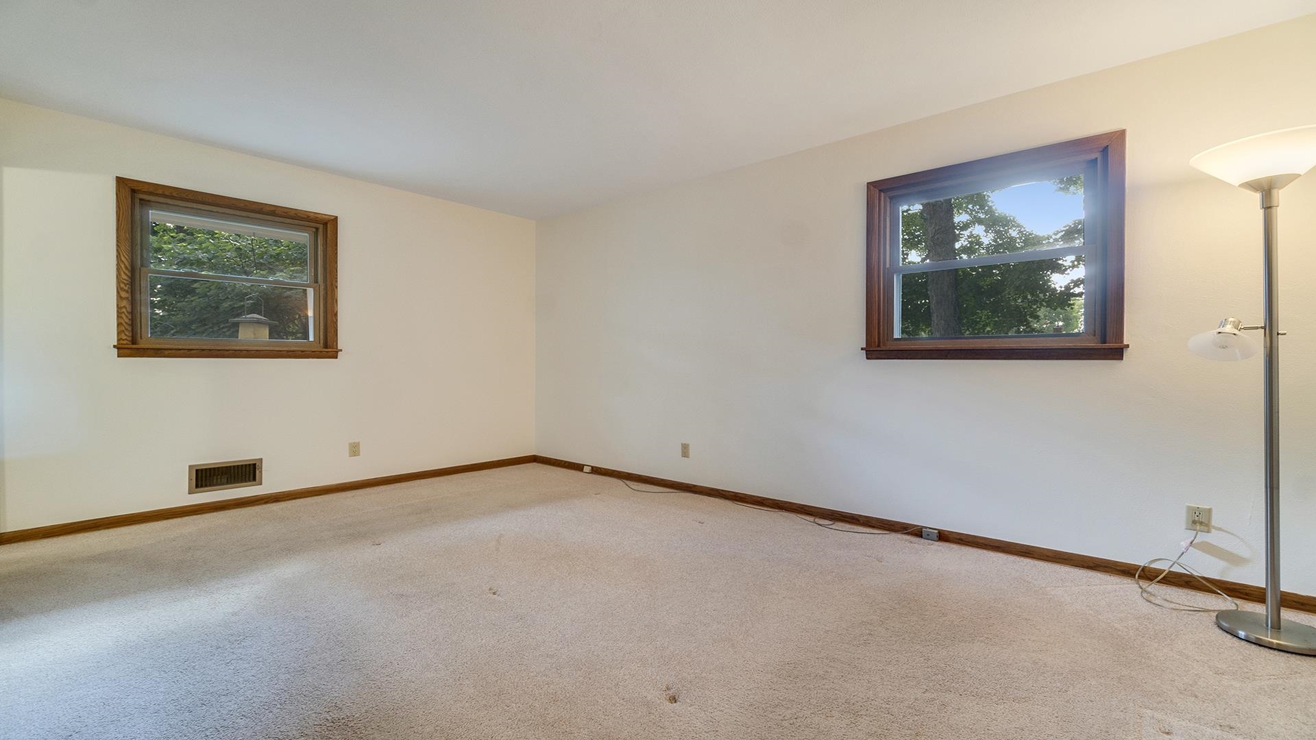 4644 Pepper Drive Rockford, IL 61114 - Photo 28 of 45 a view of an empty room with a painting on the wall