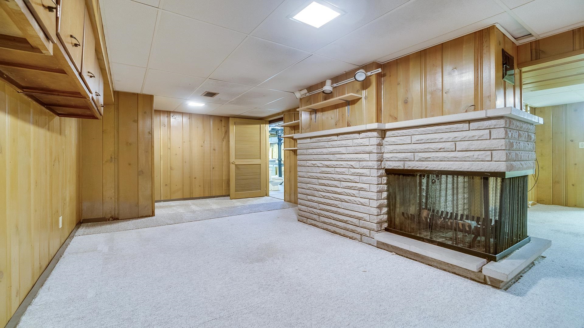 4644 Pepper Drive Rockford, IL 61114 - Photo 38 of 45 a view of empty room with fireplace