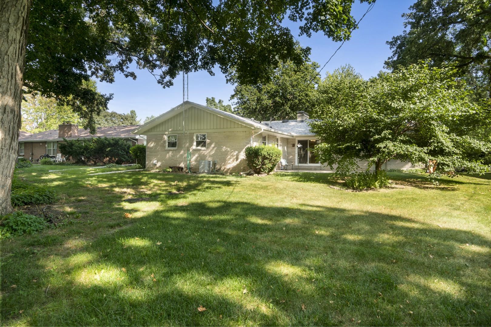 4644 Pepper Drive Rockford, IL 61114 - Photo 44 of 45 a swimming pool with outdoor seating and yard