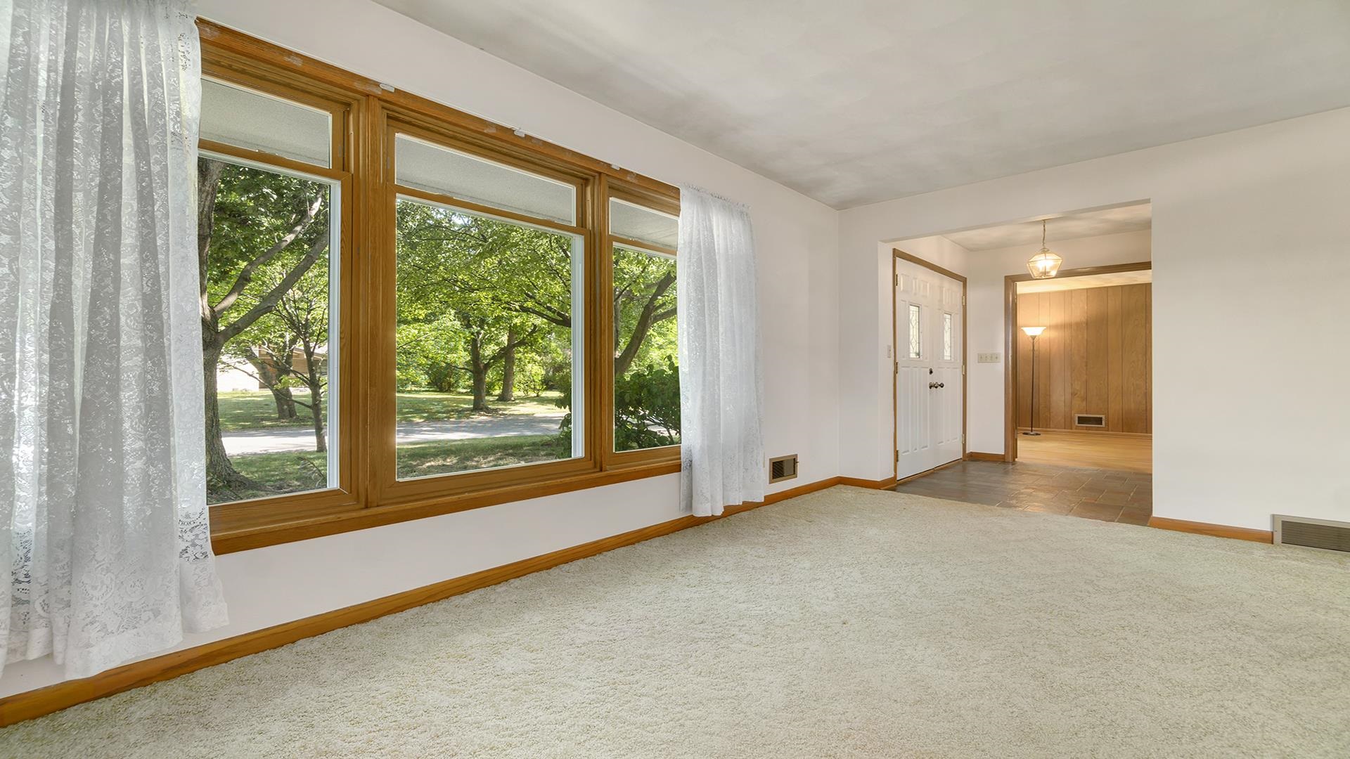 4644 Pepper Drive Rockford, IL 61114 - Photo 9 of 45 a view of an empty room with a window