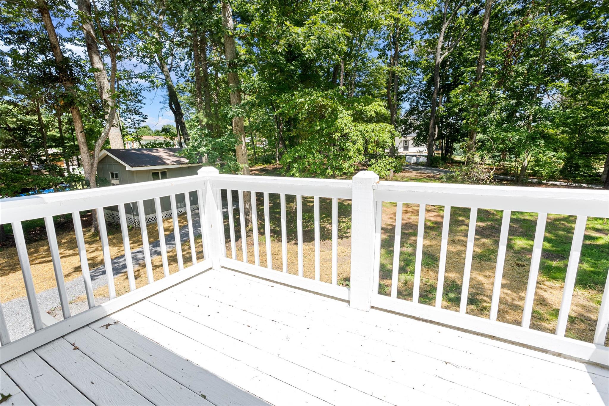 233 Youngs Cove Road Candler, NC 28715 - Photo 28 of 47 a view of a house with a backyard