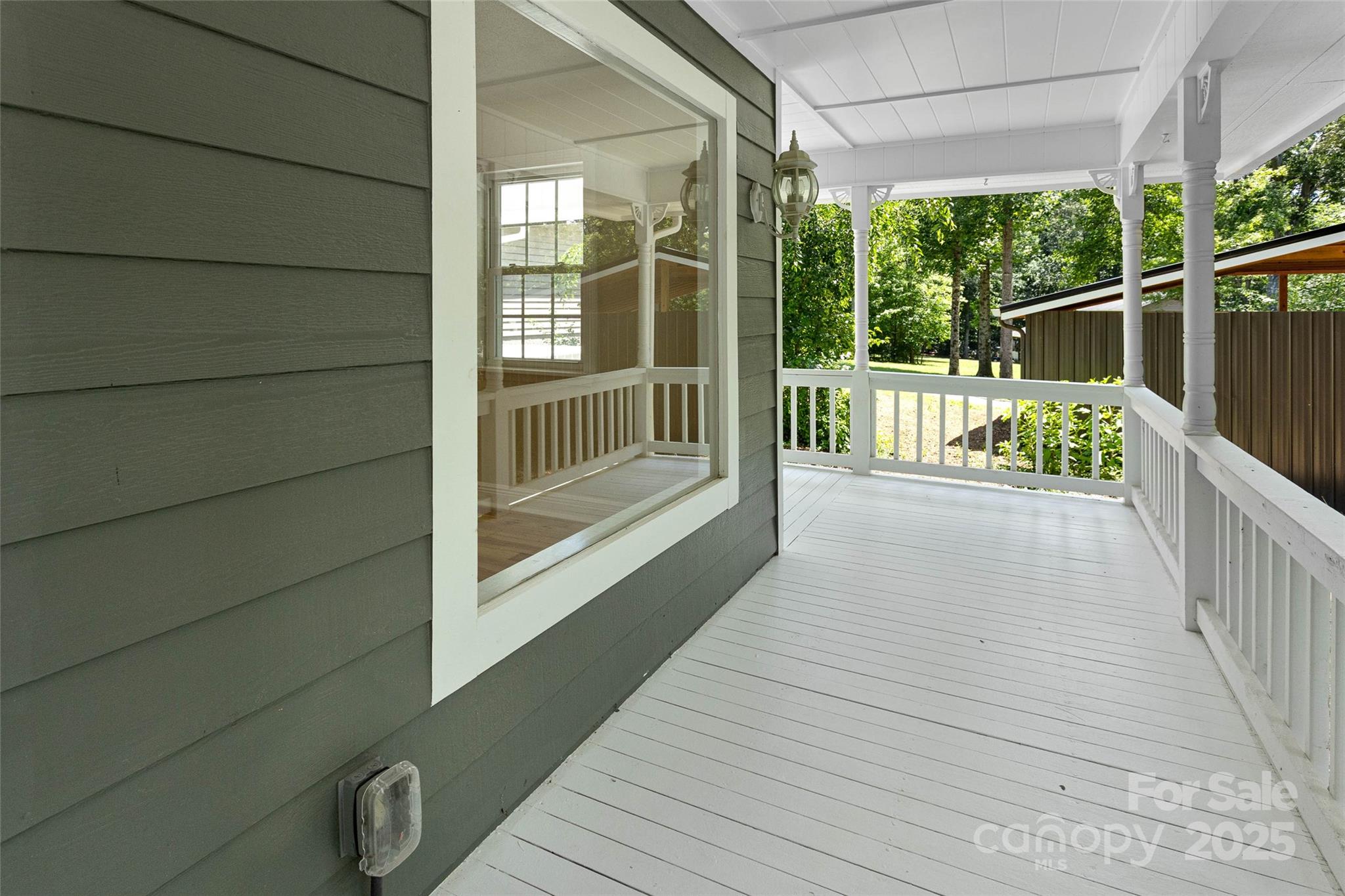 233 Youngs Cove Road Candler, NC 28715 - Photo 32 of 47 a balcony with view of wooden floor