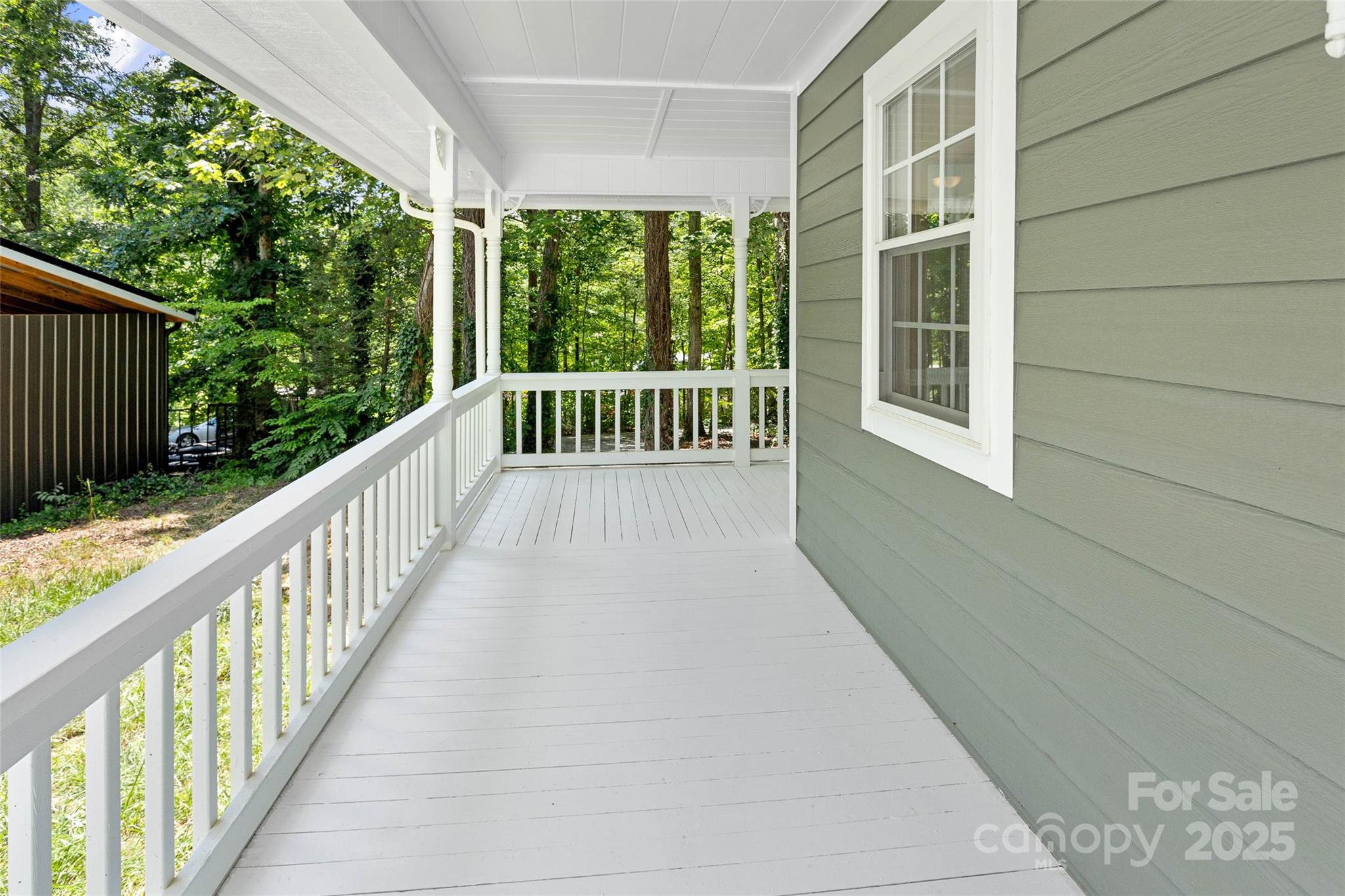 233 Youngs Cove Road Candler, NC 28715 - Photo 33 of 47 a view of balcony with garden