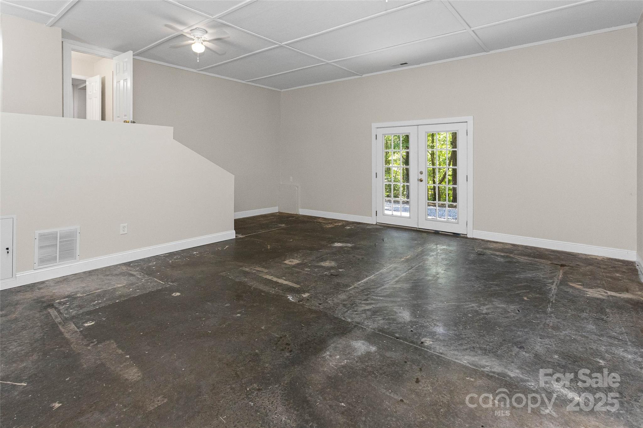 233 Youngs Cove Road Candler, NC 28715 - Photo 35 of 47 a view of an empty room with a window