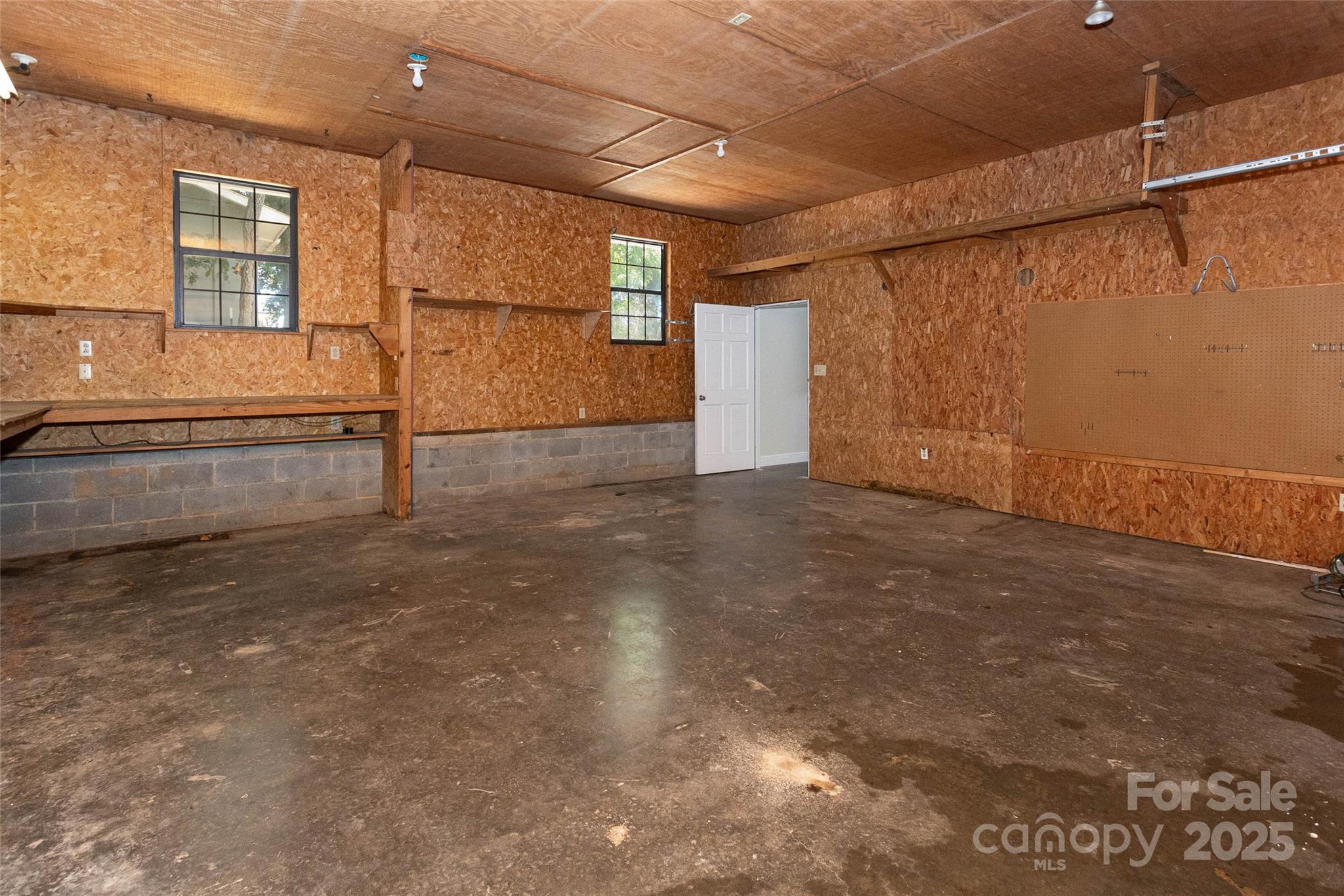 233 Youngs Cove Road Candler, NC 28715 - Photo 37 of 47 a view of a garage