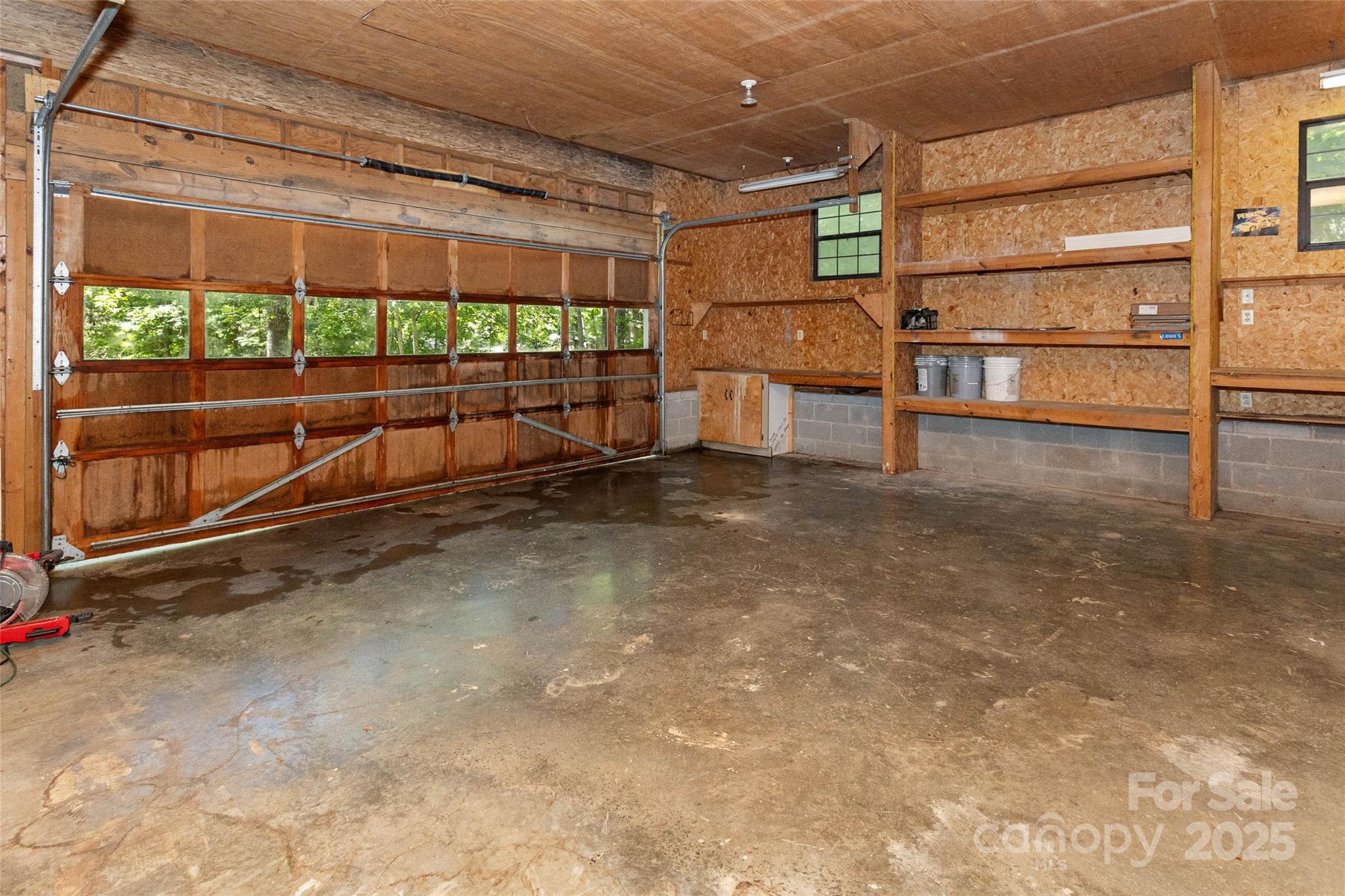 233 Youngs Cove Road Candler, NC 28715 - Photo 38 of 47 an empty room with windows