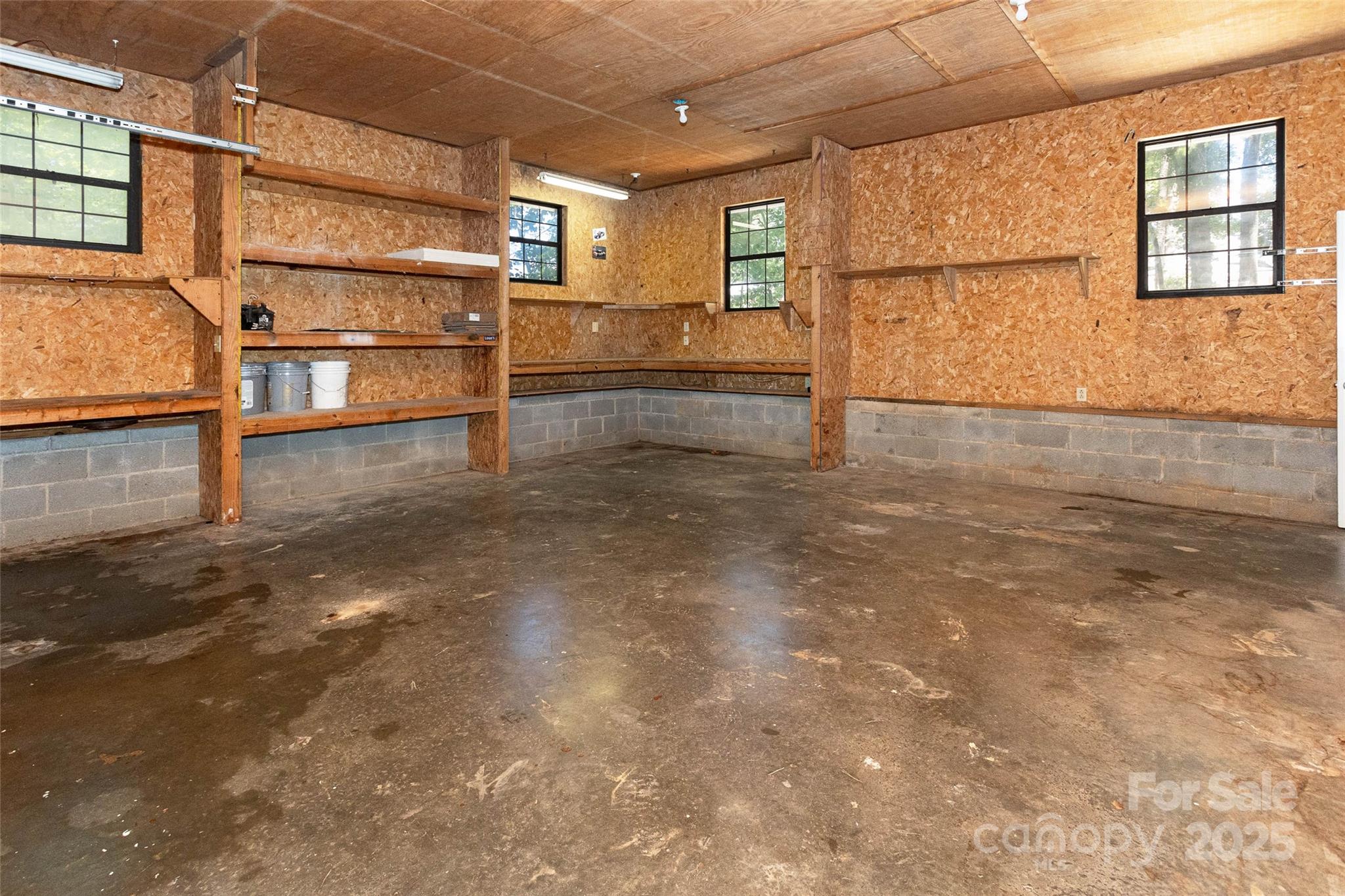 233 Youngs Cove Road Candler, NC 28715 - Photo 39 of 47 a view of a room with racks on the wall