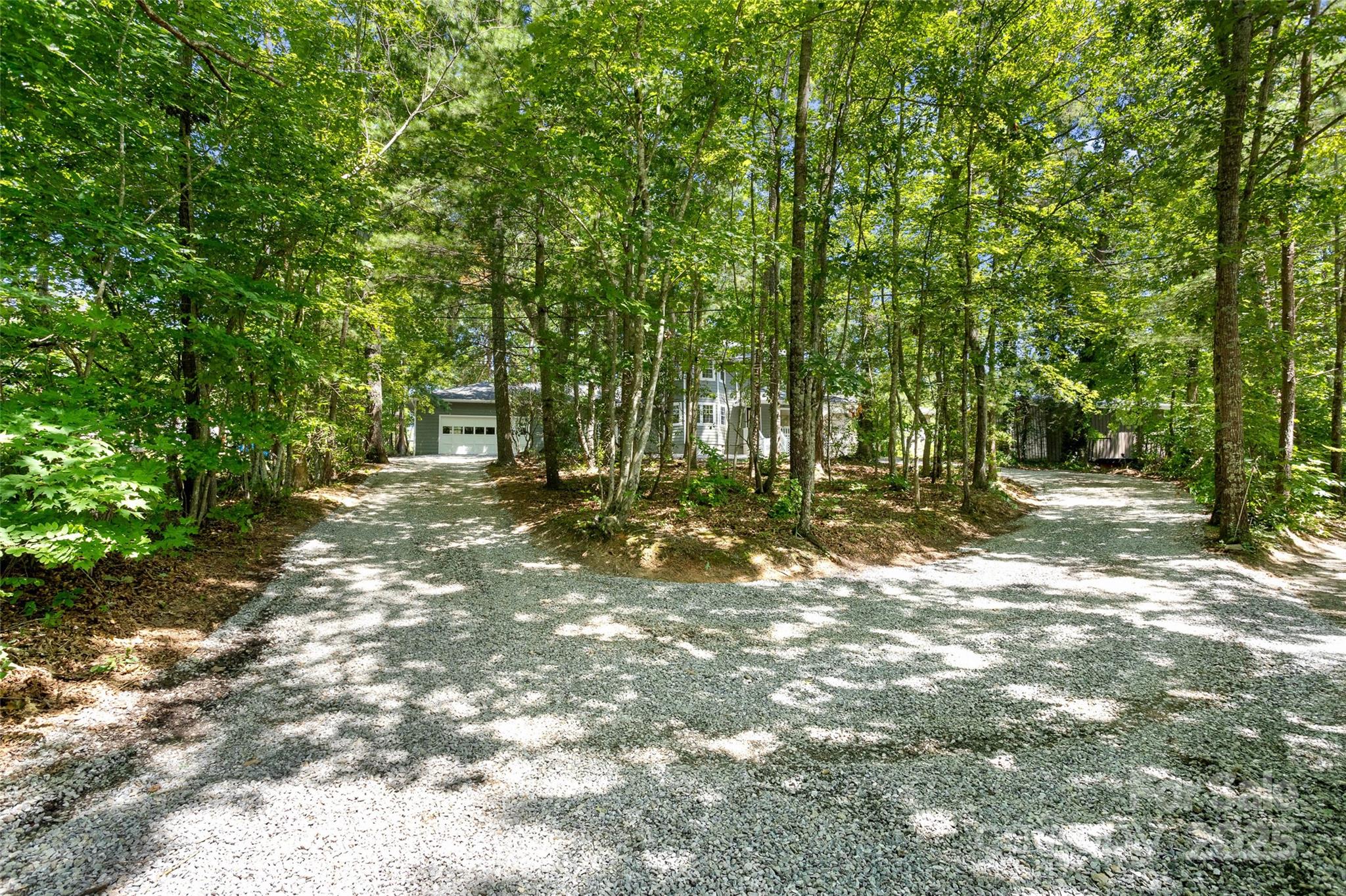 233 Youngs Cove Road Candler, NC 28715 - Photo 46 of 47 a view of outdoor space with trees