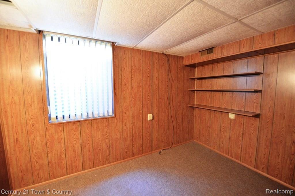 683 Tennyson, Unit 31 Rochester, MI 48307 - Photo 26 of 48 Great space for an office, or den - egress window
