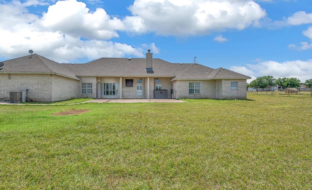 265 Wade Road Eddy, TX 76524 - Photo 55 of 71 a view of a house with a yard
