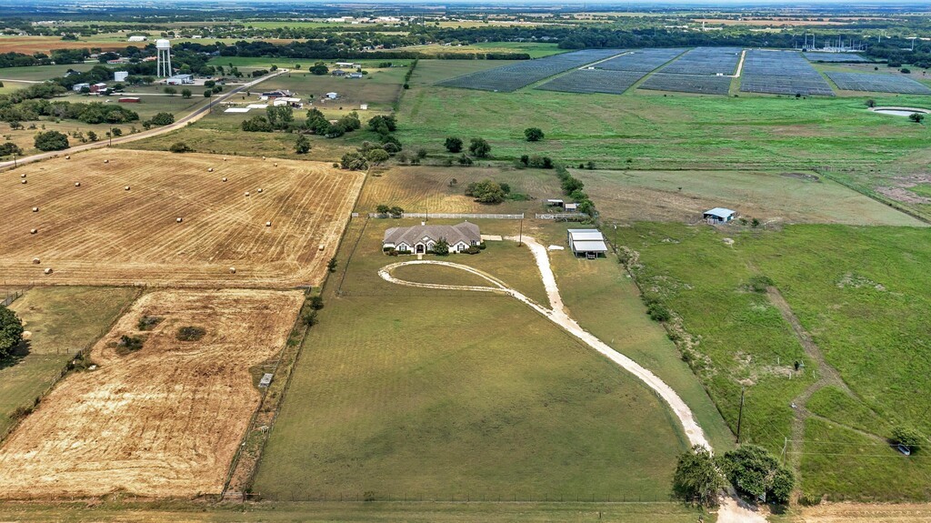 265 Wade Road Eddy, TX 76524 - Photo 65 of 71 a view of a swimming pool with a lake view