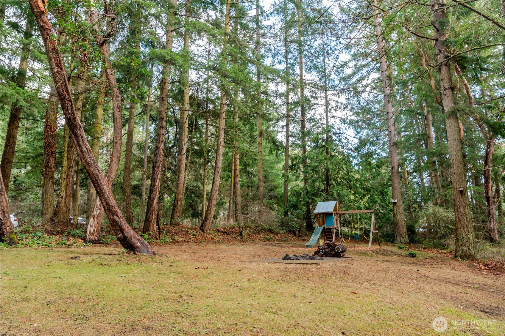 4533 South Discovery Road Port Townsend, WA 98368 - Photo 25 of 32 a view of a entertaining space with iron fence