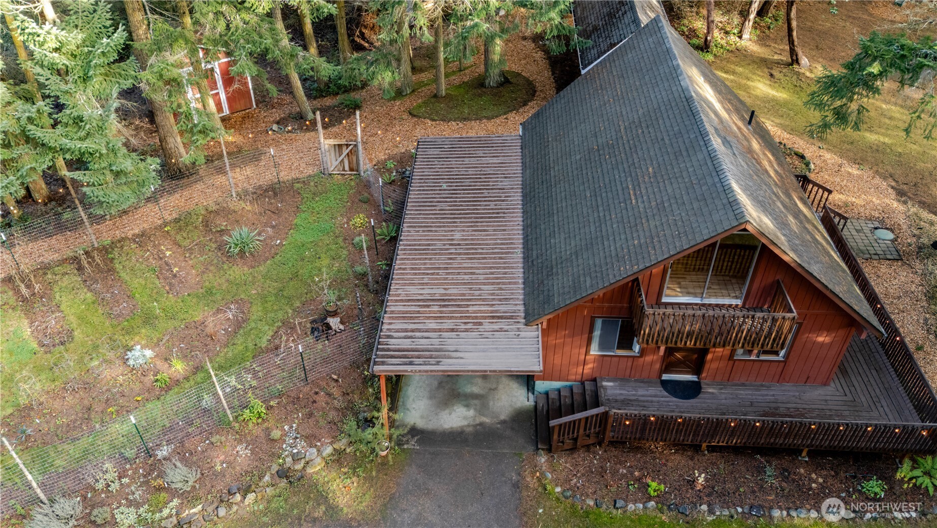 4533 South Discovery Road Port Townsend, WA 98368 - Photo 30 of 32 a front view of a house with a yard