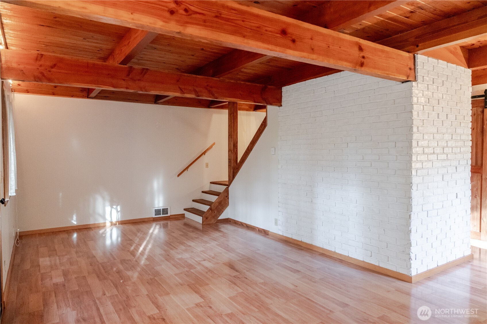 4533 South Discovery Road Port Townsend, WA 98368 - Photo 5 of 32 a view of entryway with wooden floor