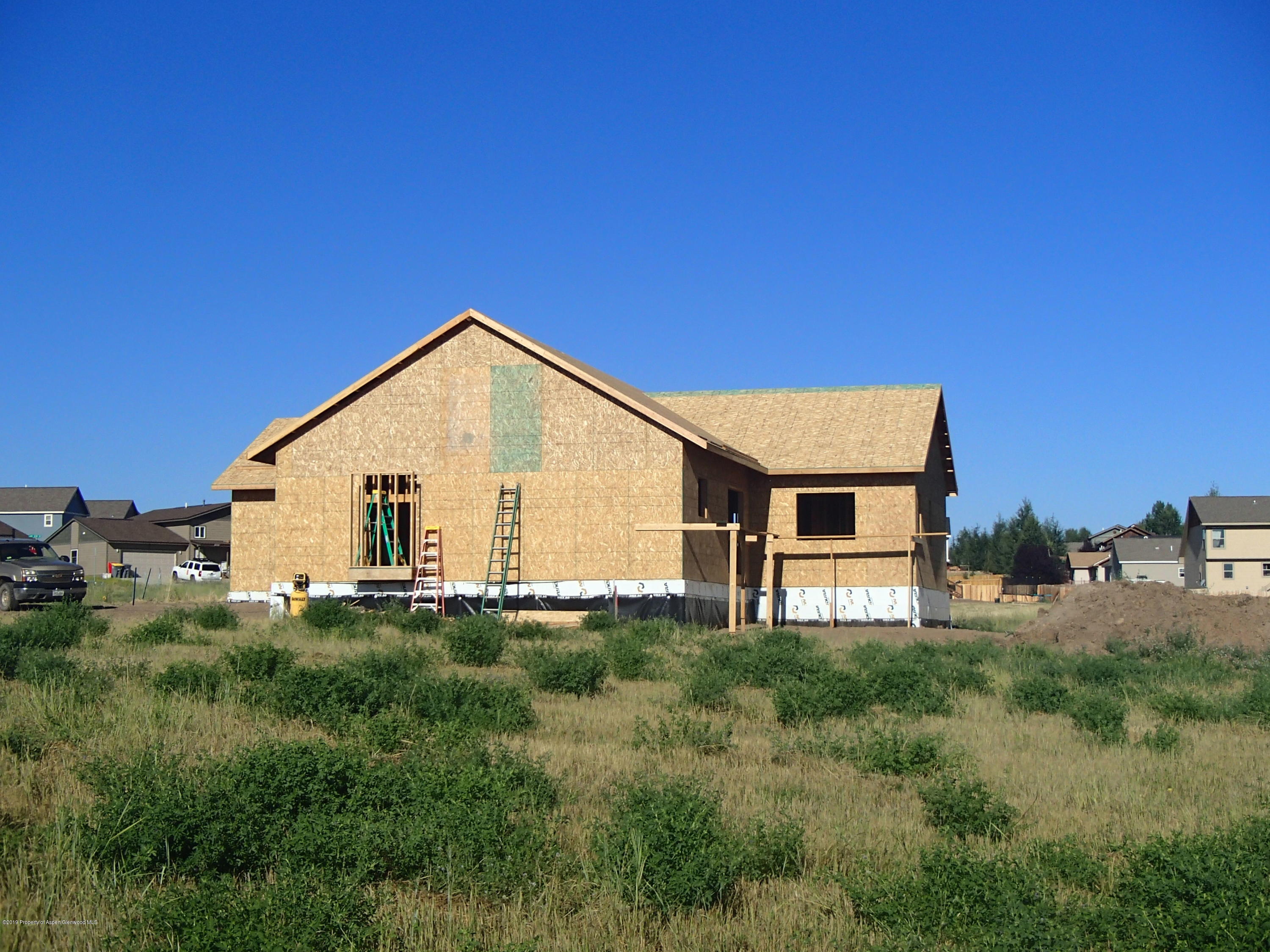 303 Little Bend Road Hayden, CO 81639 - Photo 4 of 8 a view of a house with a yard