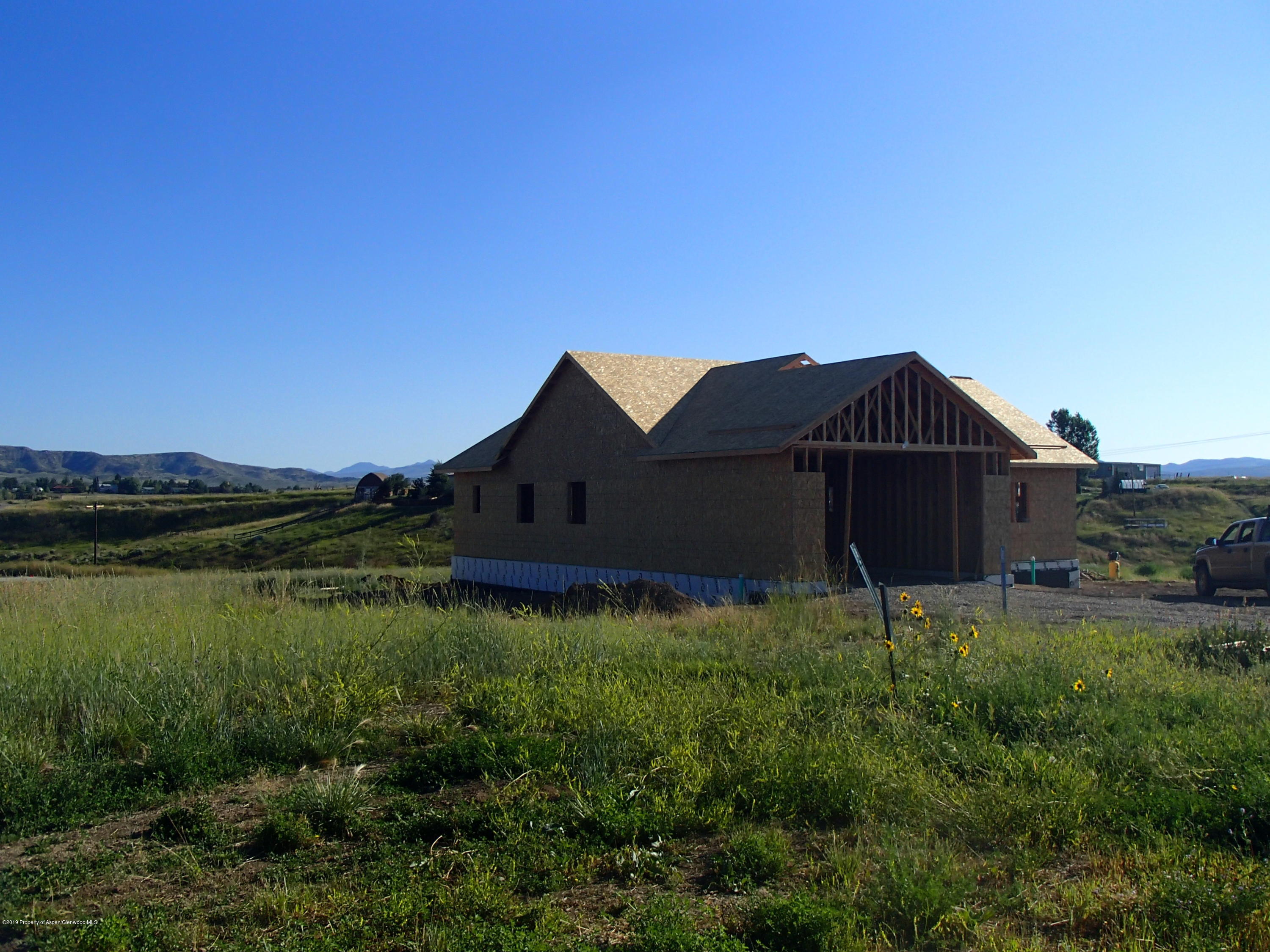 303 Little Bend Road Hayden, CO 81639 - Photo 8 of 8 a view of a house with a yard