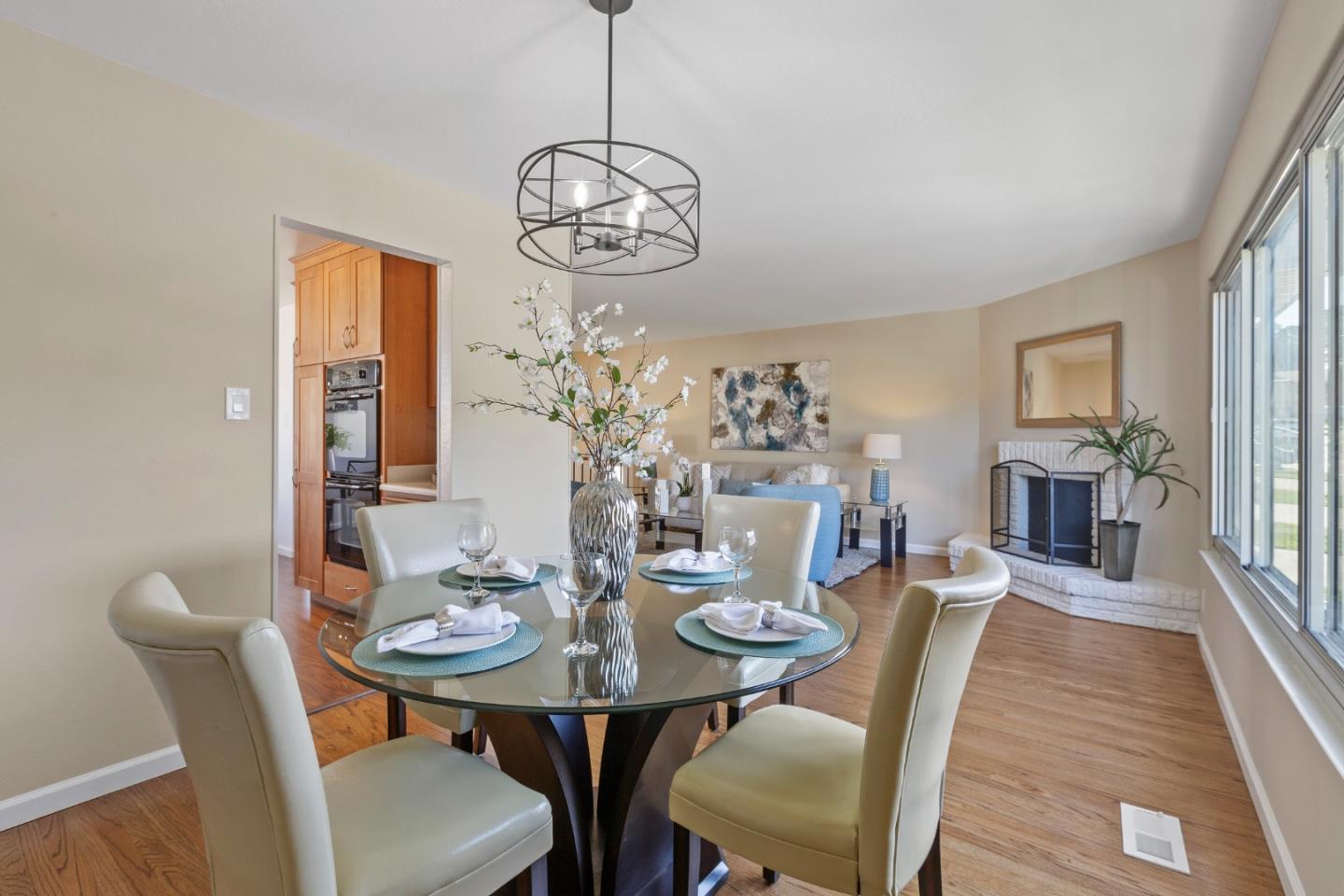 4366 Callan Boulevard Daly City, CA 94015 - Photo 11 of 38 a view of a dining room with furniture wooden floor and chandelier