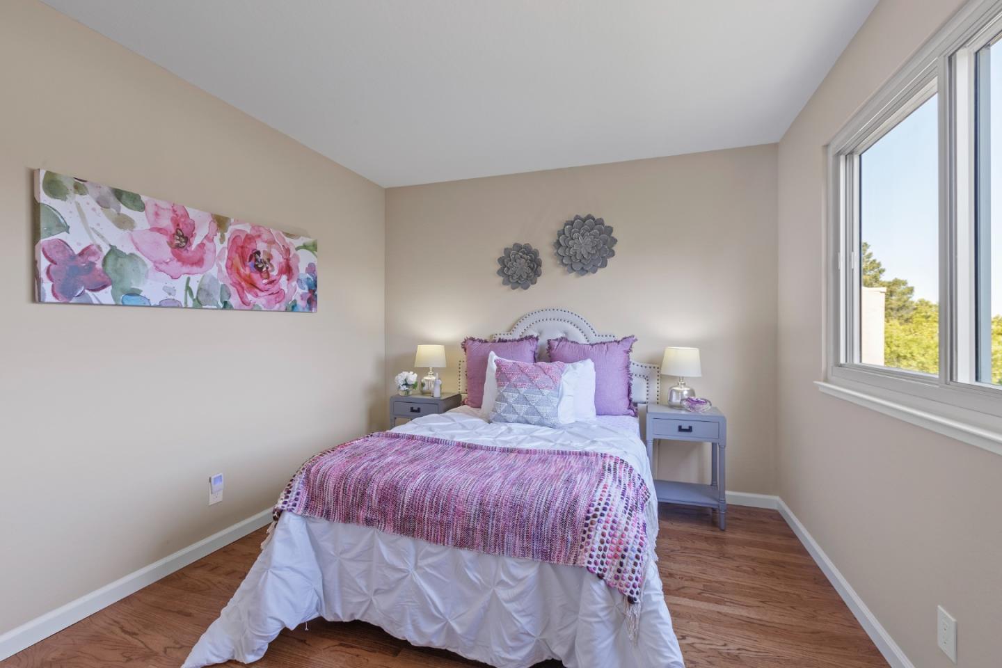 4366 Callan Boulevard Daly City, CA 94015 - Photo 20 of 38 a bedroom with a bed and a window