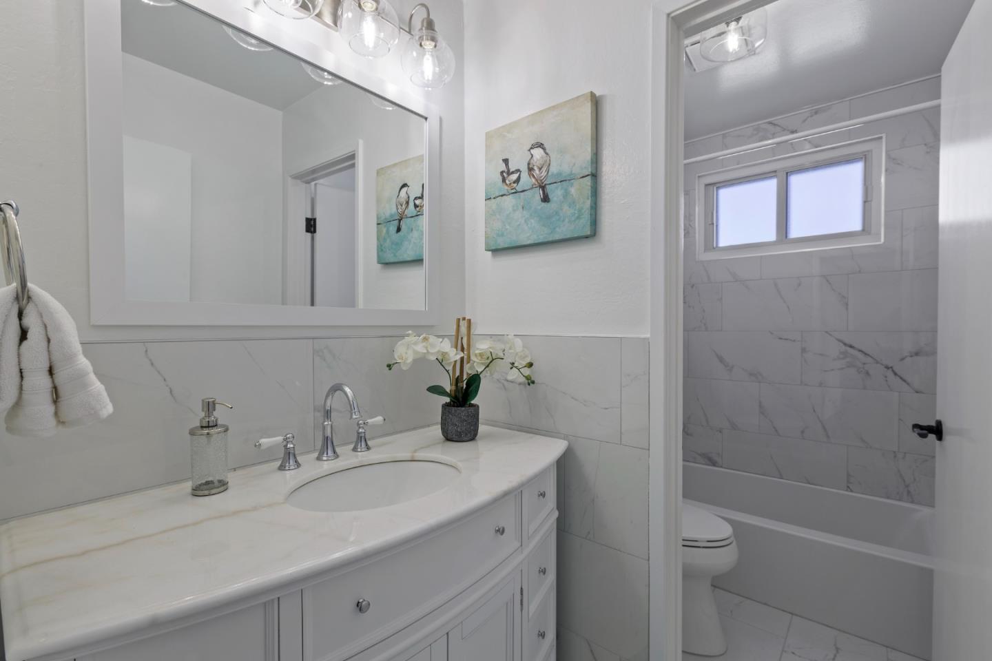 4366 Callan Boulevard Daly City, CA 94015 - Photo 23 of 38 a bathroom with a sink toilet and shower