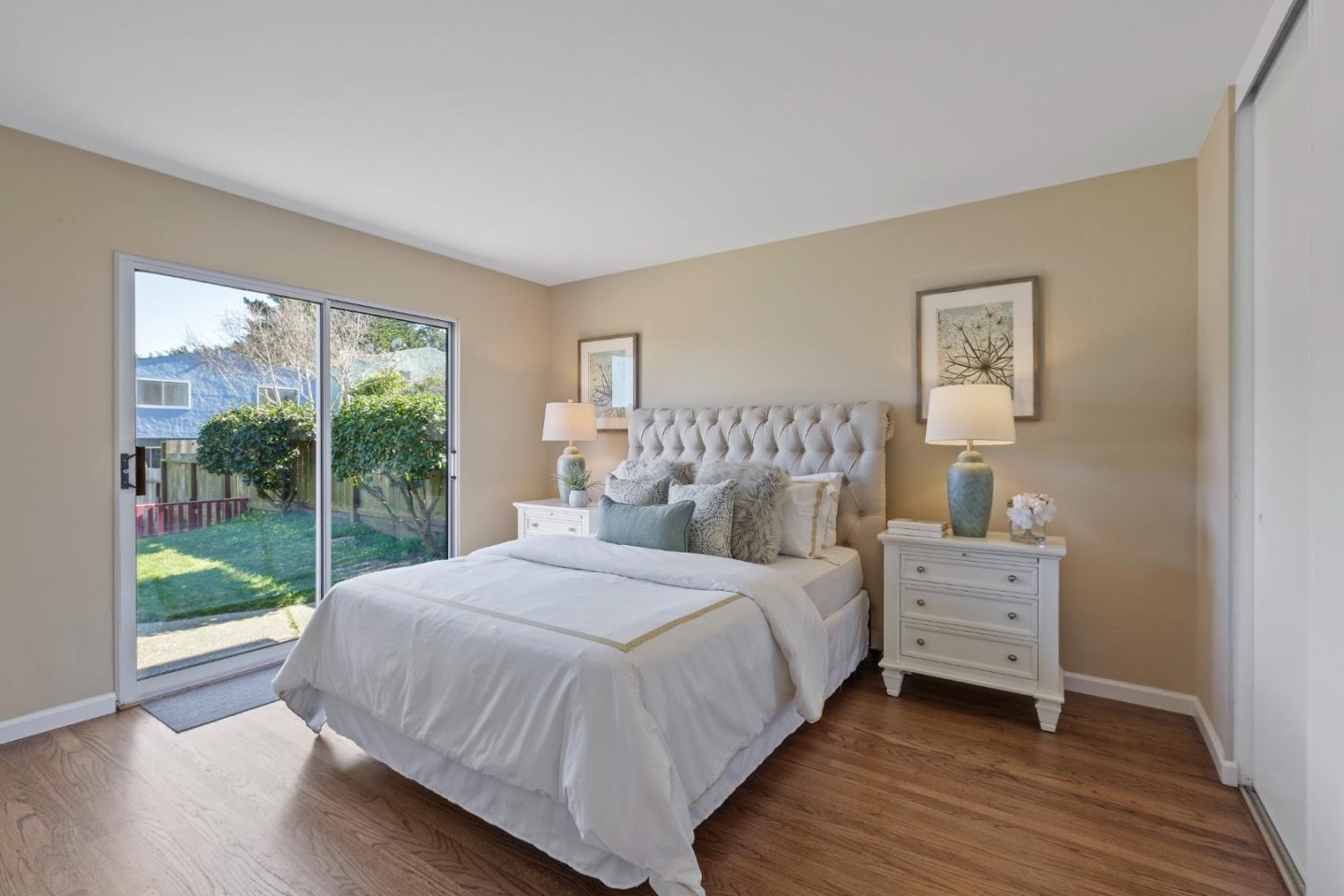 4366 Callan Boulevard Daly City, CA 94015 - Photo 25 of 38 a bedroom with a bed and a window