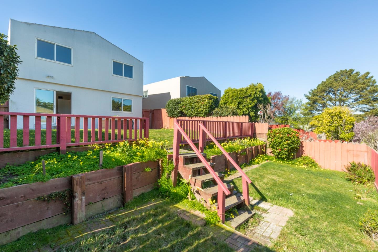 4366 Callan Boulevard Daly City, CA 94015 - Photo 35 of 38 a view of a backyard with a swing