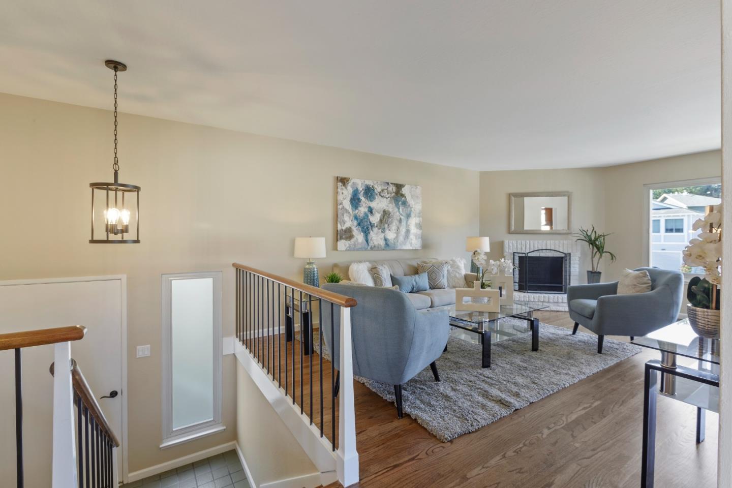 4366 Callan Boulevard Daly City, CA 94015 - Photo 5 of 38 a living room with furniture and a fireplace
