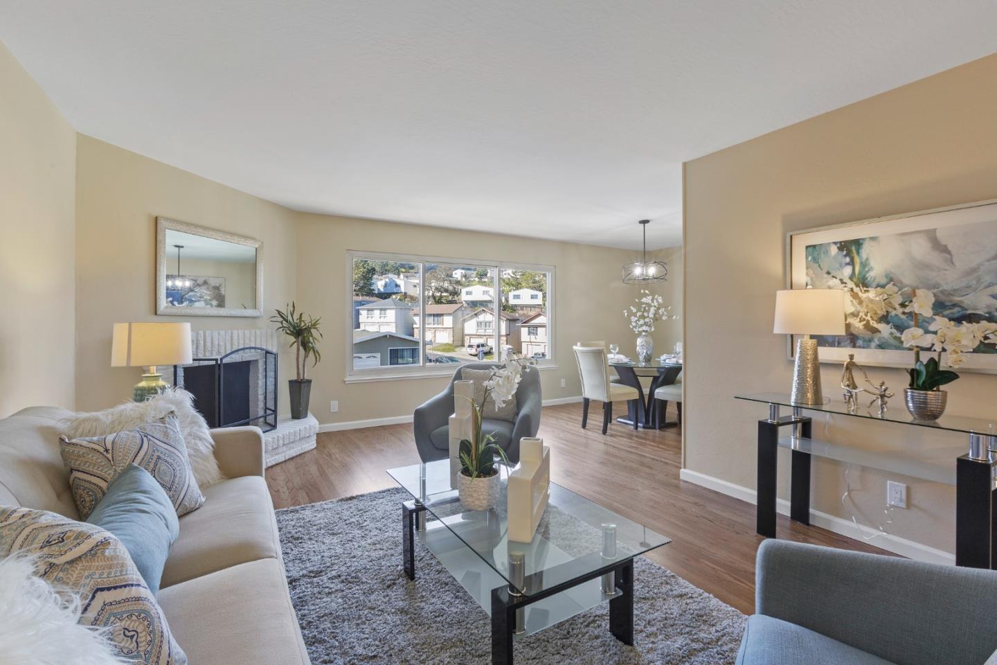 4366 Callan Boulevard Daly City, CA 94015 - Photo 9 of 38 a living room with furniture and a wooden floor