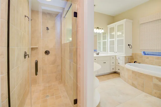 a bathroom with a bathtub sink and toilet