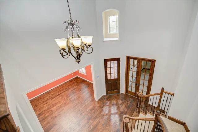 a view of a hallway with a door