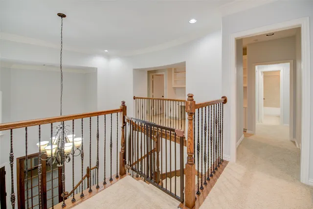 a spacious bathroom with double vanity and mirrors