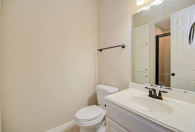 a bathroom with a sink a toilet and a bathtub