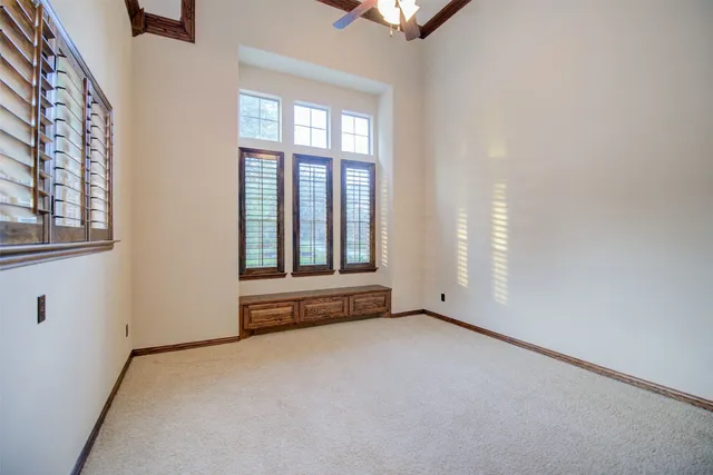 an empty room with windows