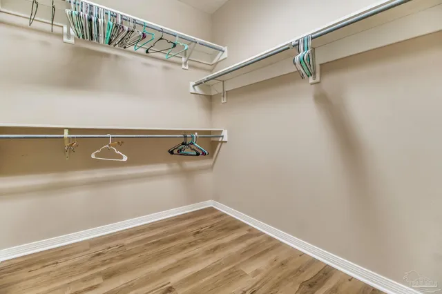 a view of a room with racks on the wall