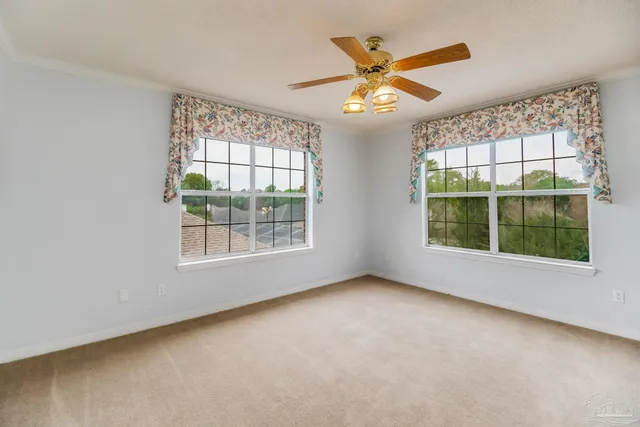 a bathroom with a double vanity sink toilet and a mirror