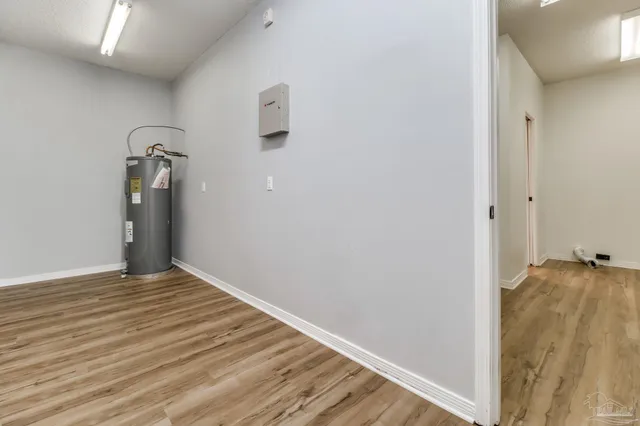 a view of an empty room with a balcony