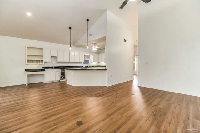 a view of kitchen with wooden floor