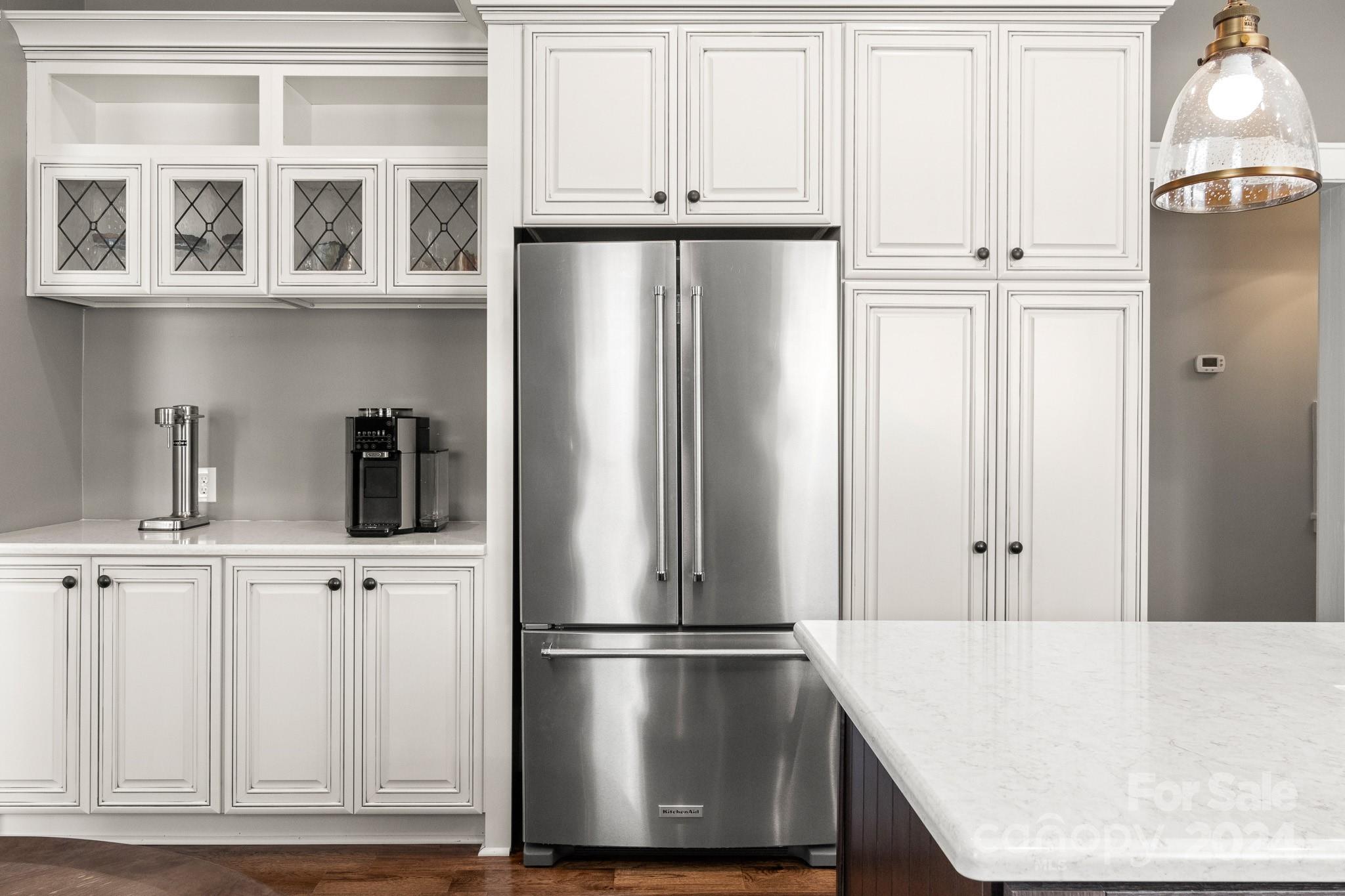 221 Ridgeway Avenue Statesville, NC 28677 - Photo 14 of 45 a white refrigerator freezer sitting in a kitchen
