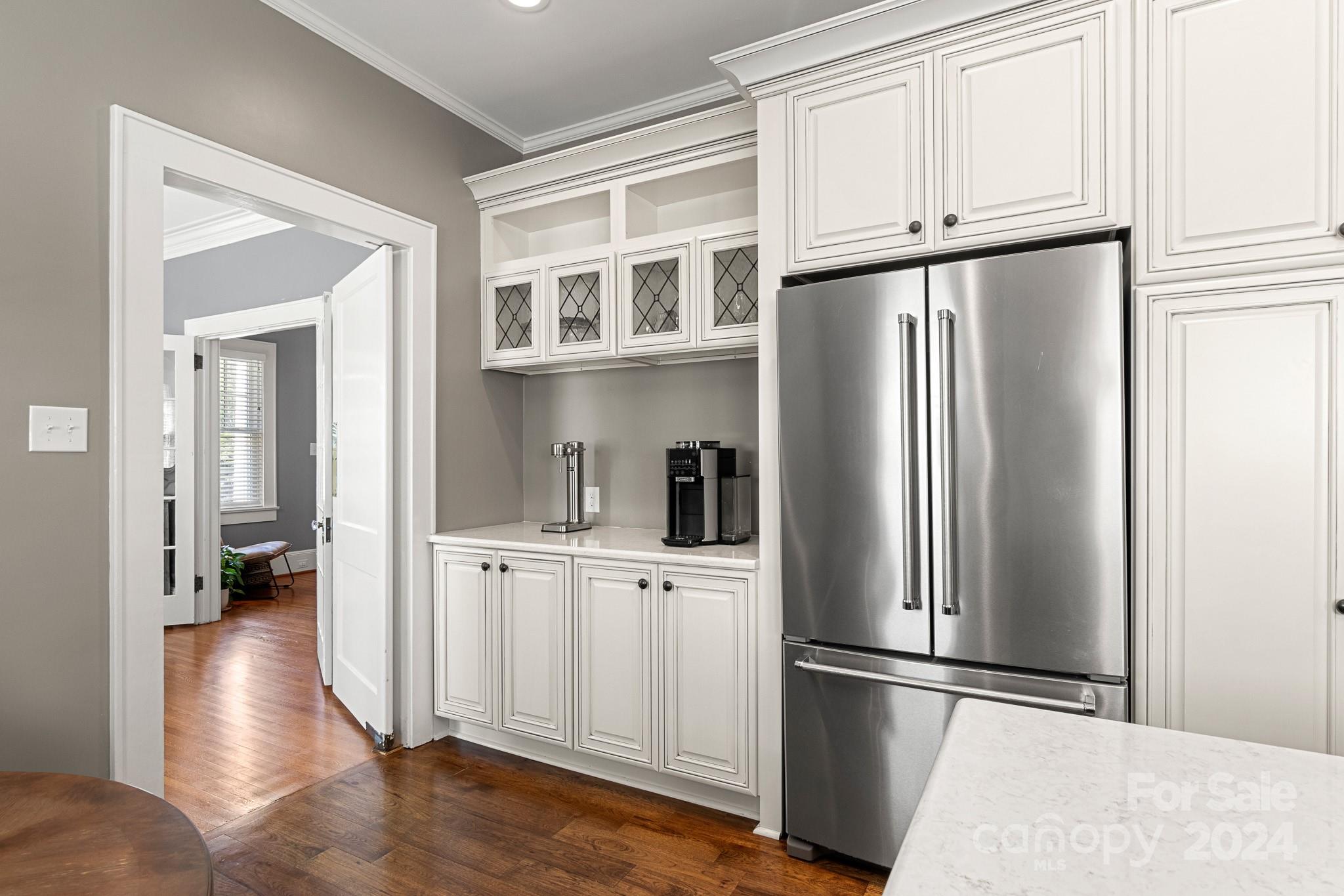 221 Ridgeway Avenue Statesville, NC 28677 - Photo 15 of 45 a kitchen with stainless steel appliances a refrigerator and a stove top oven